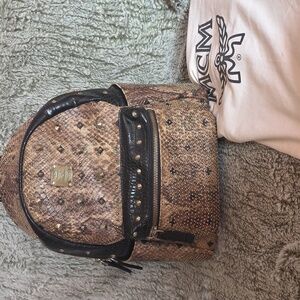 MCM Snakeskin Studded Backpack